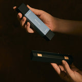 Professional product shot of Earl of East Shinrin-Yoku incense sticks with dark background