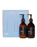 Onsen Hand Cleansing Kit by Earl of East with hand wash and hand balm in amber glass pump bottles.