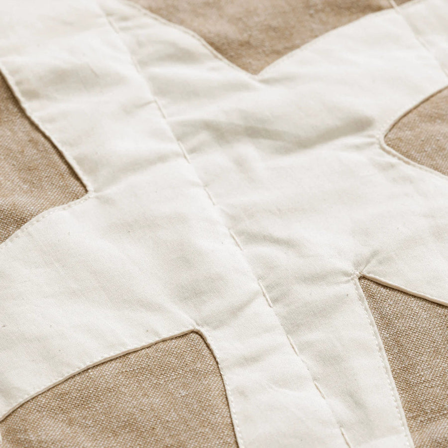 Kove Applique Quilted Blanket, Tan/Cashmere by ferm LIVING, close-up of the appliqué