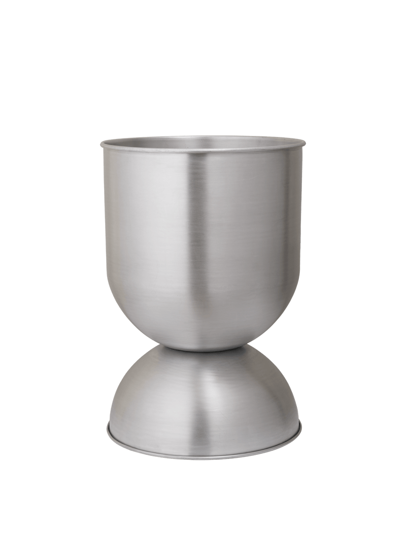  Hourglass Pots, Various Sizes, Aluminium by ferm LIVING, on a green background 
