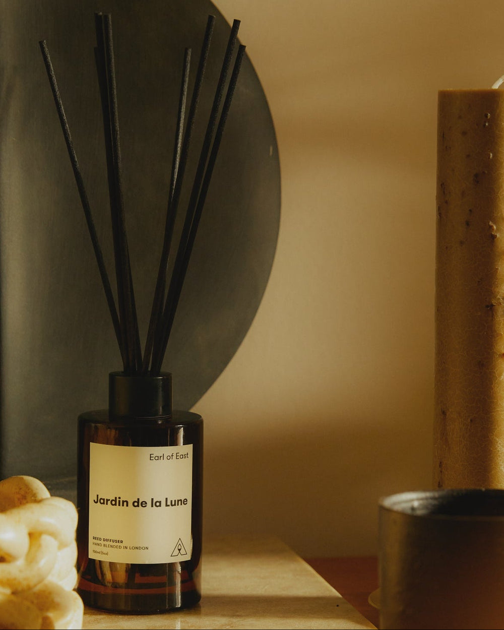 Jardin de la Lune Reed Diffuser, 150ml by Earl of East, on a shelf in warm light