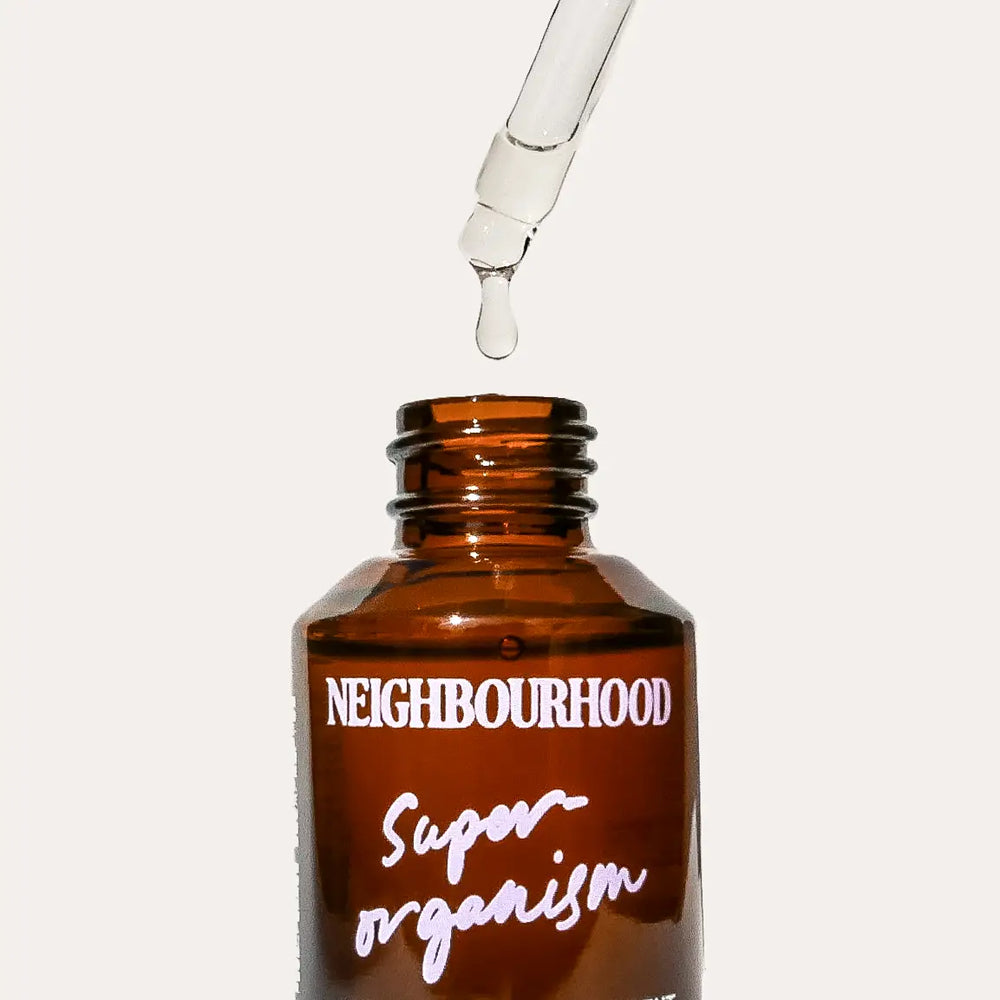 ‘Superorganism’ Hyaluronic Bioferment Tonic, 30ml by Neighbourhood Botanicals, with serum dropping from the pipette