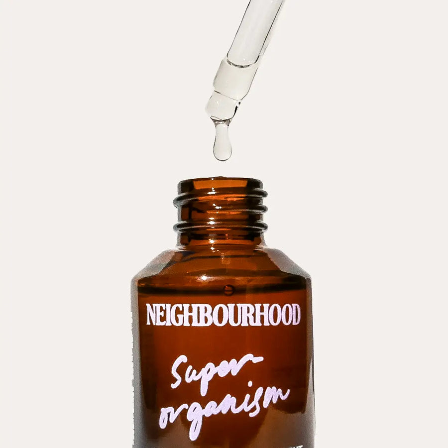 ‘Superorganism’ Hyaluronic Bioferment Tonic, 30ml by Neighbourhood Botanicals, with serum dropping from the pipette