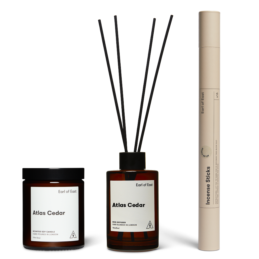 Atlas Cedar Scent Layering Set by Earl of East, with candle and incense sticks