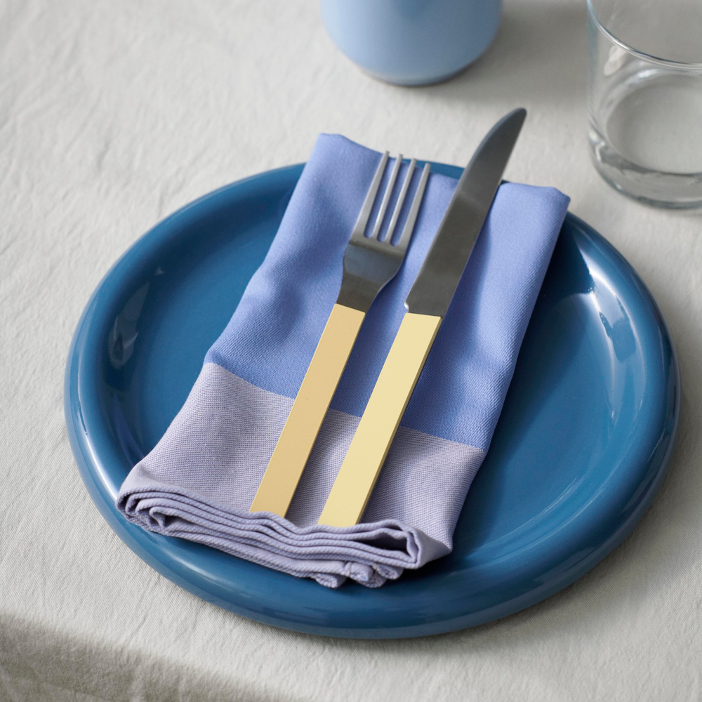 Barro Plate set of 2, Ø24, Dark Blue by HAY, with a napkin and cutlery