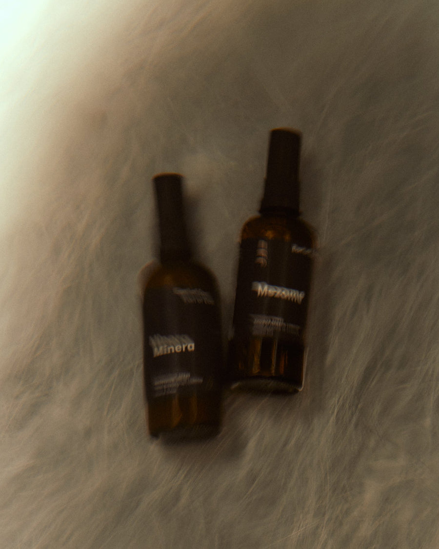Minera Magnesium Spray, 100ml by Earl of East, in a shadowy bathroom