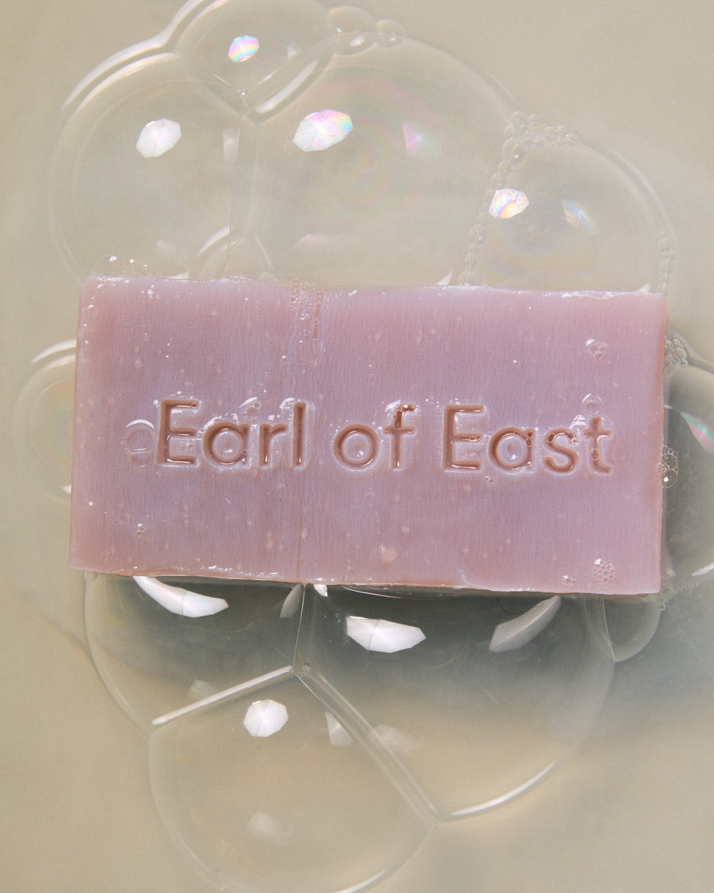 Wildflower Cleansing Bar Soap, 160g by Earl of East, bar in a soap bubble