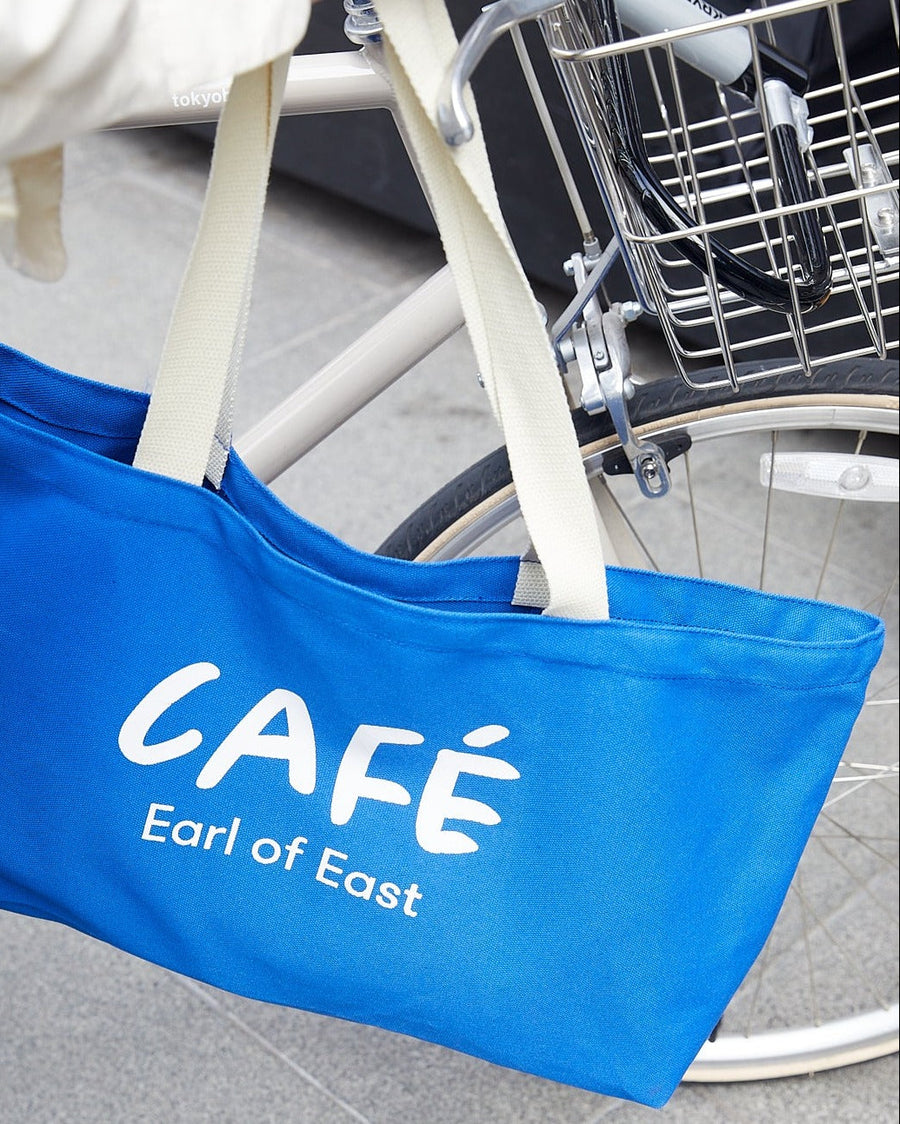 Café Canvas Market Bag, Blue by Earl of East, being carried