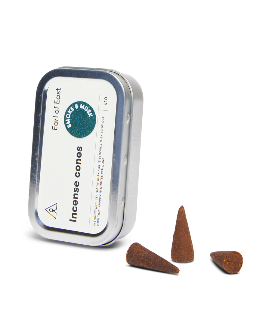 Smoke & Musk Incense Cones by Earl of East, tin open with cones beside it