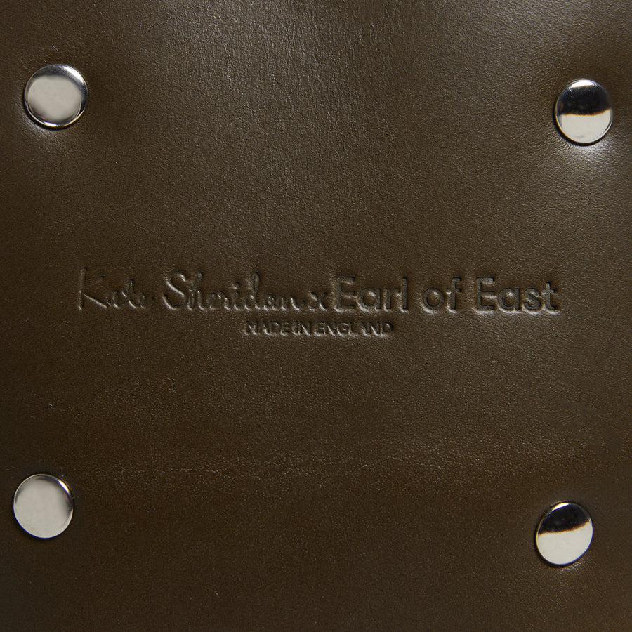 Leather Jigsaw Pouch, Olive by Earl of East x Kate Sheridan, close-up of embossed leather
