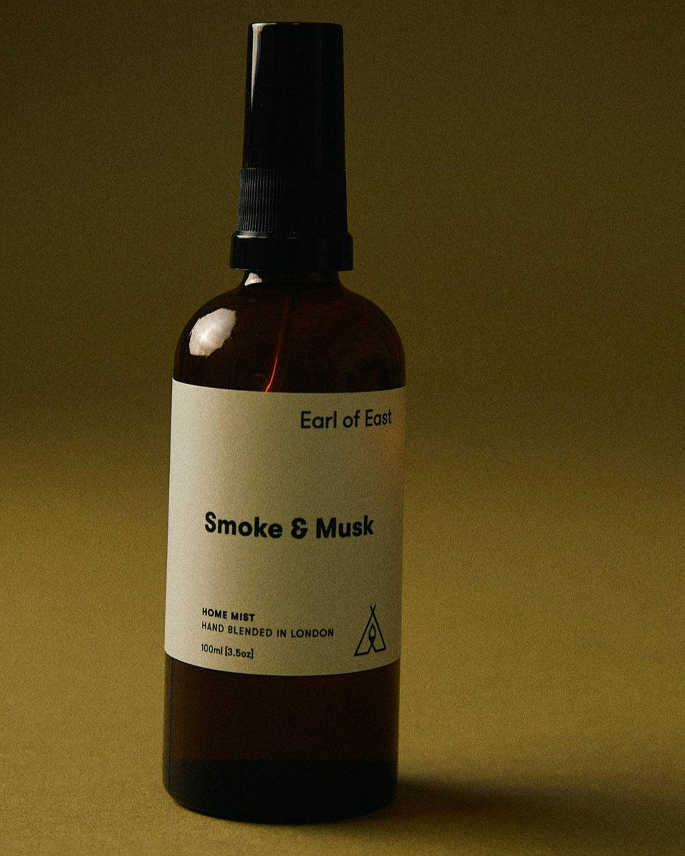 Smoke & Musk Home Mist, 100ml by Earl of East, on an olive background