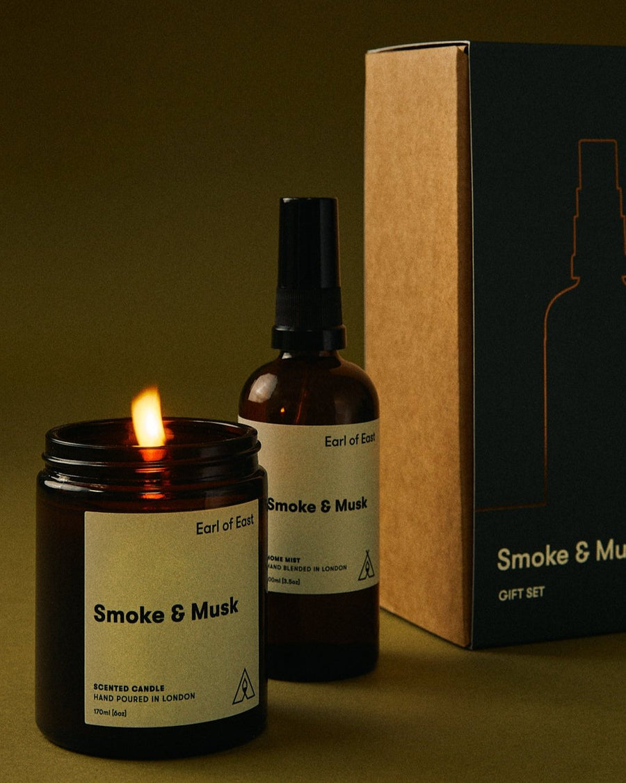 Smoke & Musk Duo Gift Set by Earl of East, candle lit beside the home mist