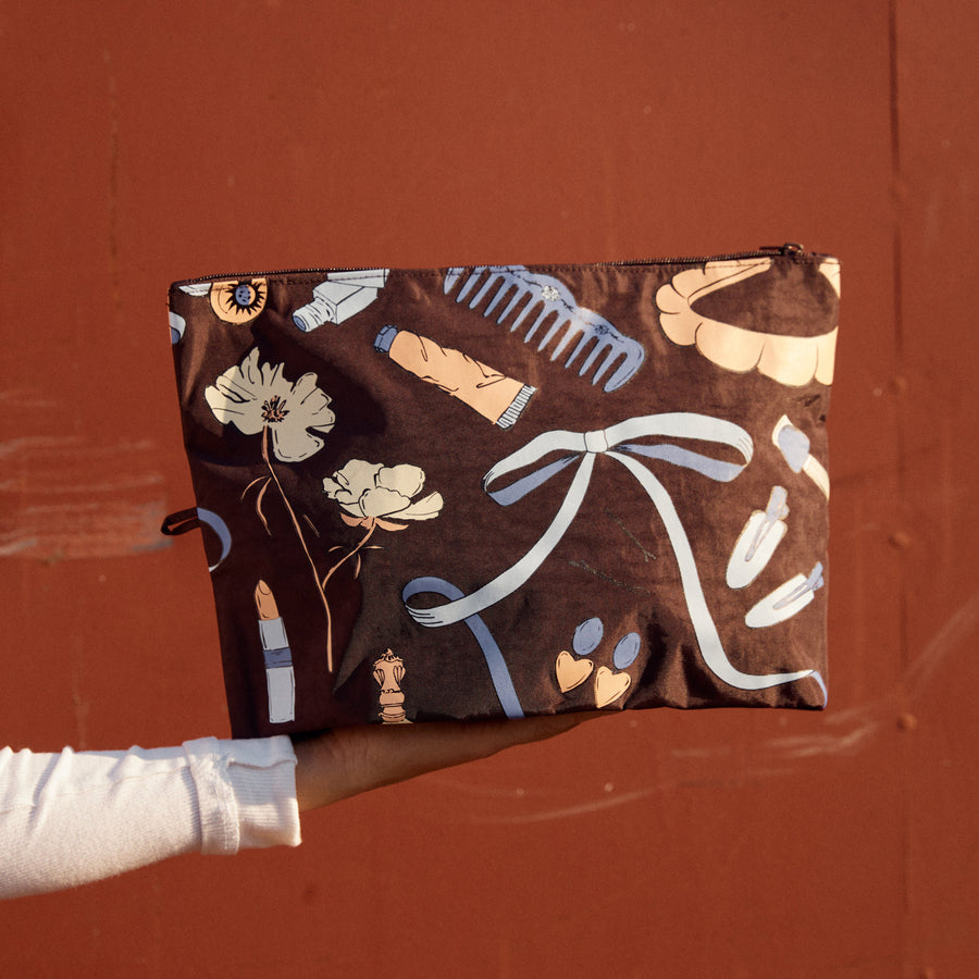 Go Pouch Set, Get Ready With Me by Baggu, on a rust background
