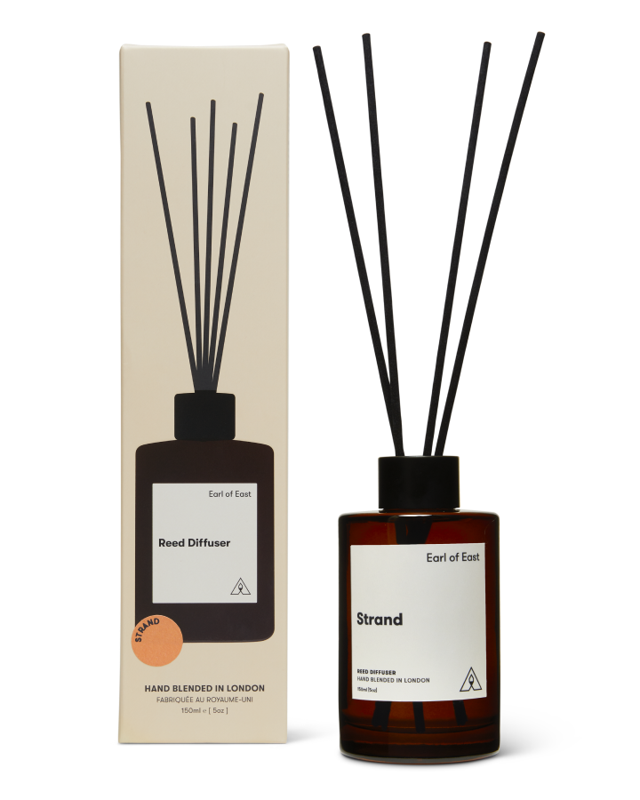 Strand Reed Diffuser 150ml by Earl of East in amber glass bottle with reeds