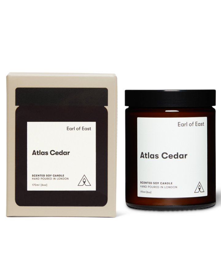 Atlas Cedar Scented Candle, 170ml by Earl of East, with its box, on a plain background