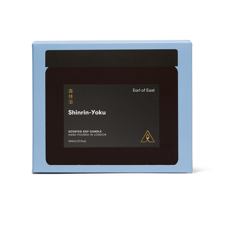 Shinrin-Yoku Large Scented Candle, 500ml by Earl of East, beside its blue box