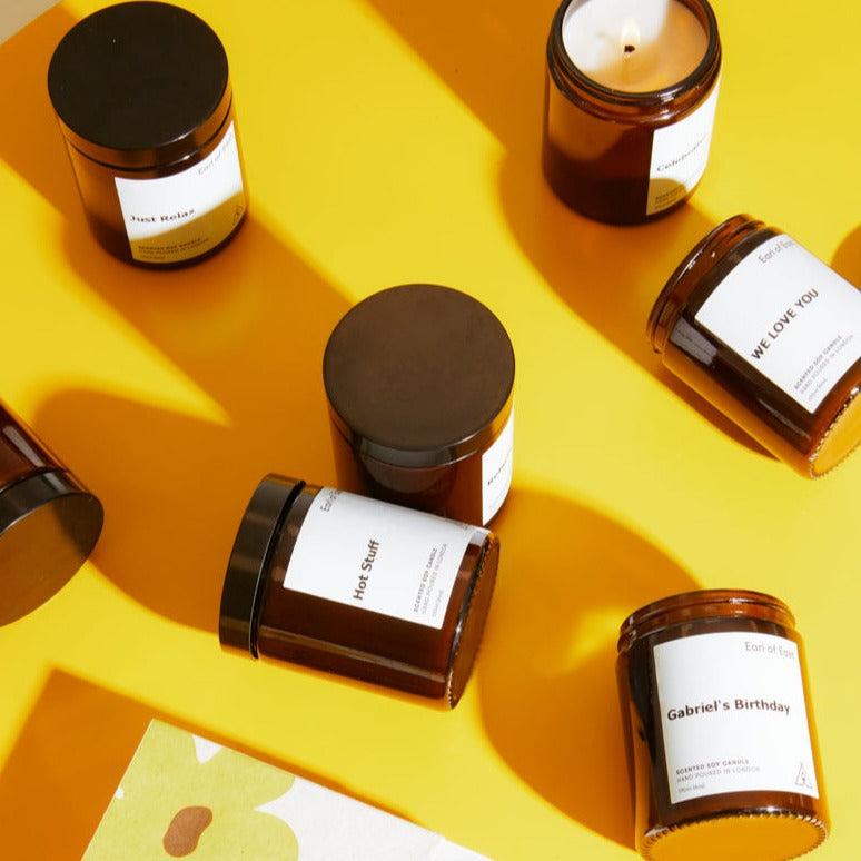 Customised Scented Candle, 170ml by Earl of East, with personalised labels on yellow