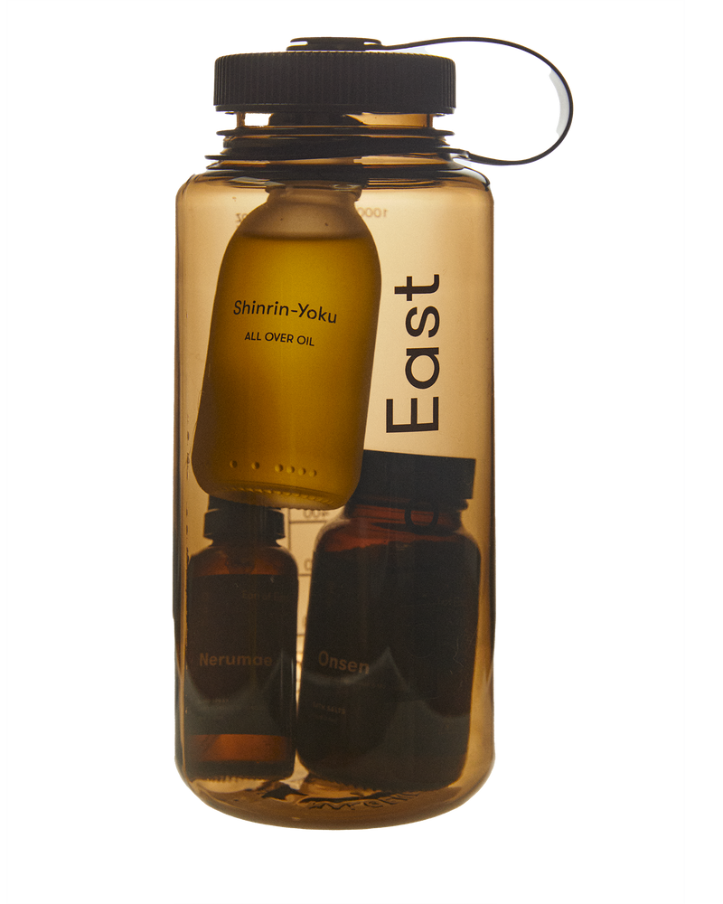  The Hydration Set by Earl of East, featuring three Bathing Line essentials presented in a reusable Nalgene bottle. 