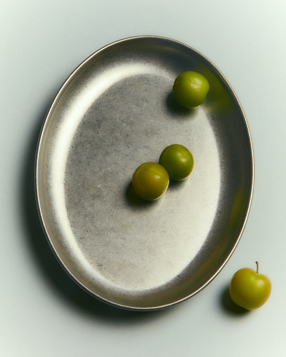 Medium Oval Serving Dish, Vintage Stainless Steel by Earl of East, holding olives