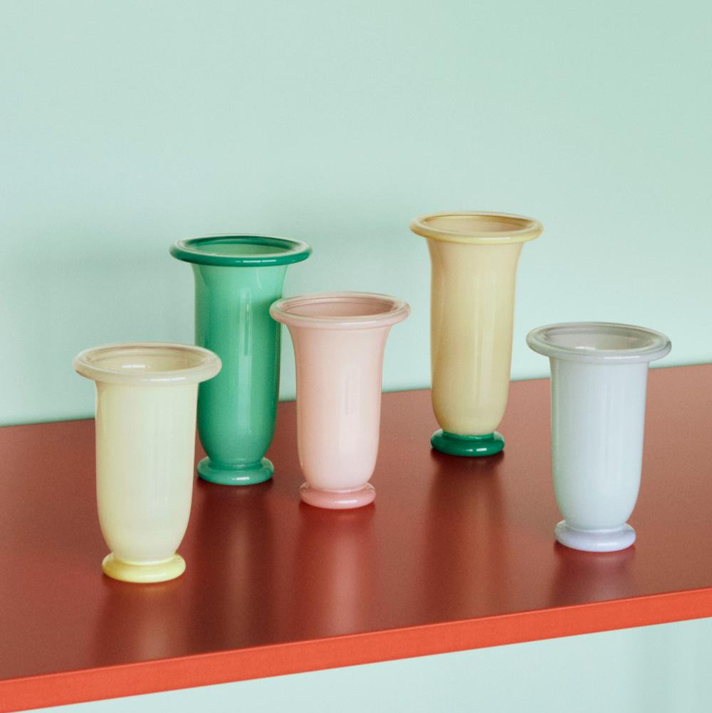 Empire Vase, Medium, Light Blue by HAY, in a range of colours on a red shelf