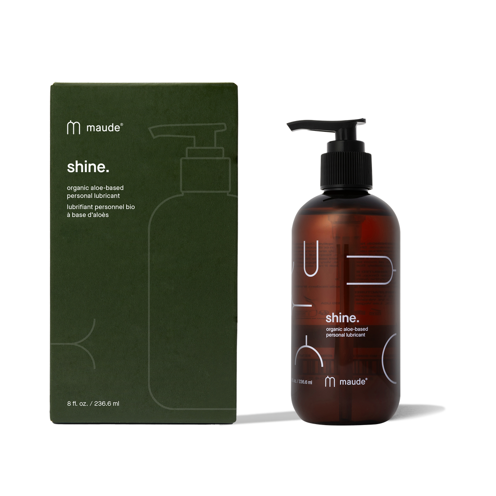 Shine Organic Lubricant, 8oz by Maude, beside its green box