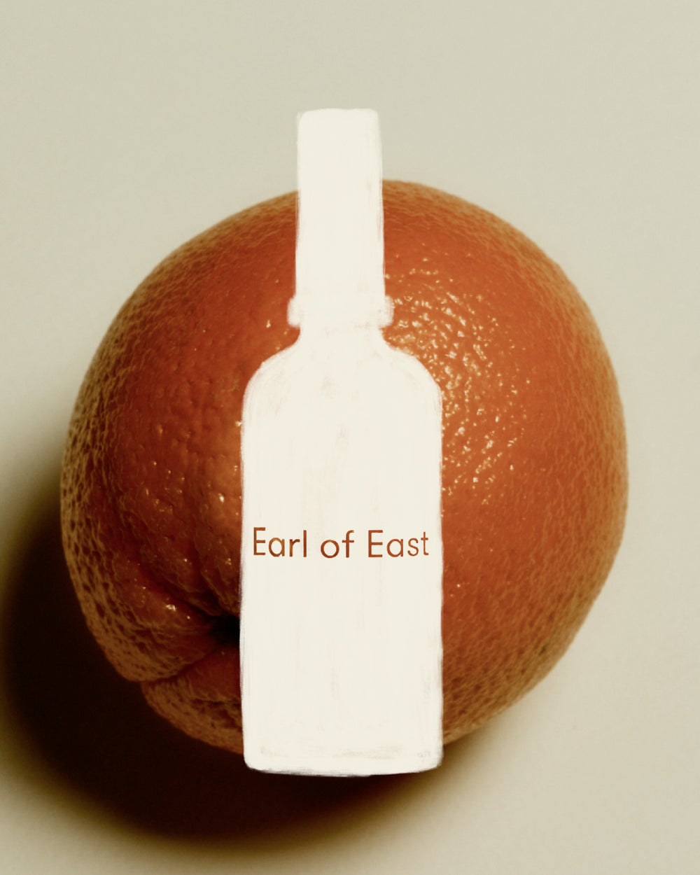 Strand Home Mist, 100ml by Earl of East, against a grapefruit