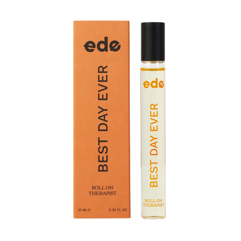  Best Day Ever Roll On Therapist, Aromatherapy Fragrance by ede, beside its orange box 