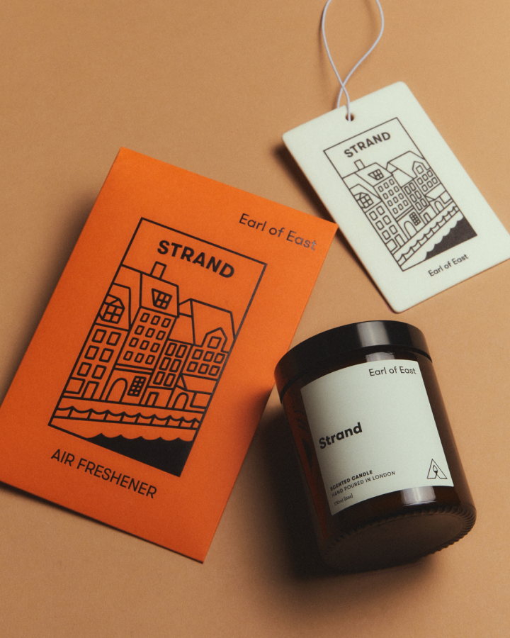Strand Starter Scent Set by Earl of East, with its orange box on tan