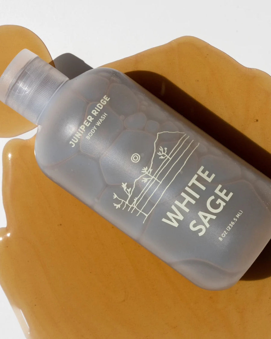 White Sage Body Wash, - 236.5ml by Juniper Ridge, on an orange backdrop