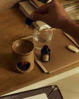 Atlas Cedar Fragrance Oil Blend 30ml styled with an oil burner for woody home fragrance