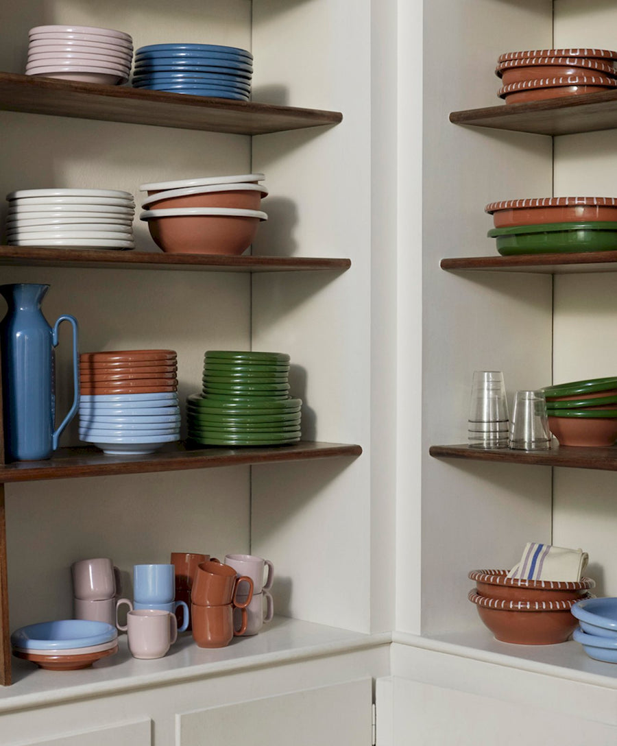 Barro Plate set of 2, Ø24, Green by HAY, on open kitchen shelves