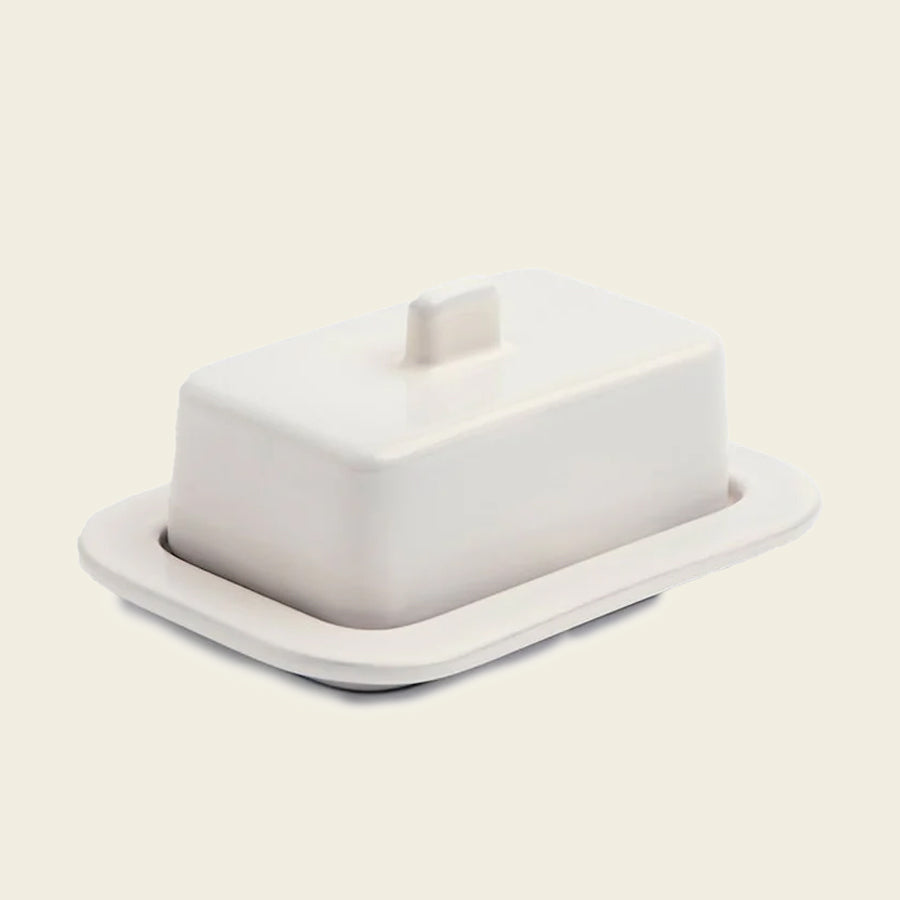 Barro Butter Dish, Off-White by HAY, on a cream background