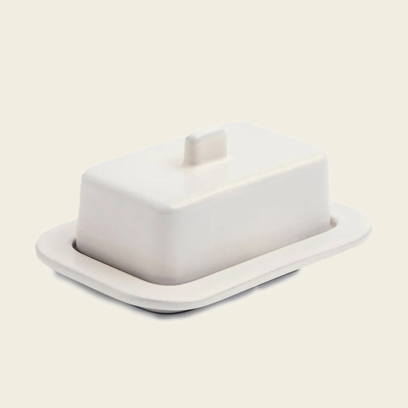  Barro Butter Dish, Off-White by HAY, on a cream background 