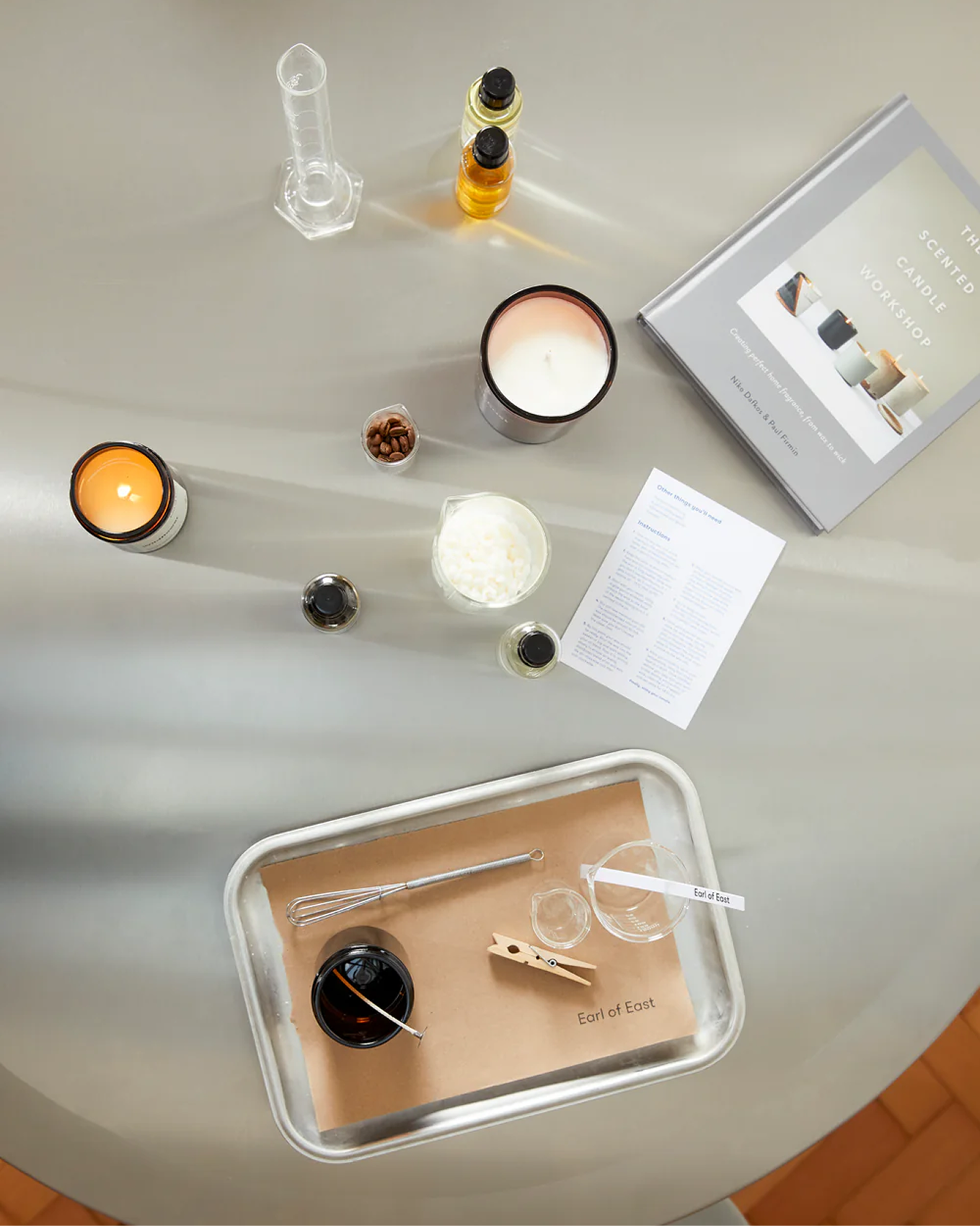 Earl of East candle making workshop materials on a white table