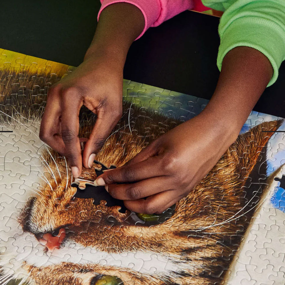 Howdy Paw-tner Jigsaw Puzzle, 500 pcs by Le Puzz, being assembled on a table