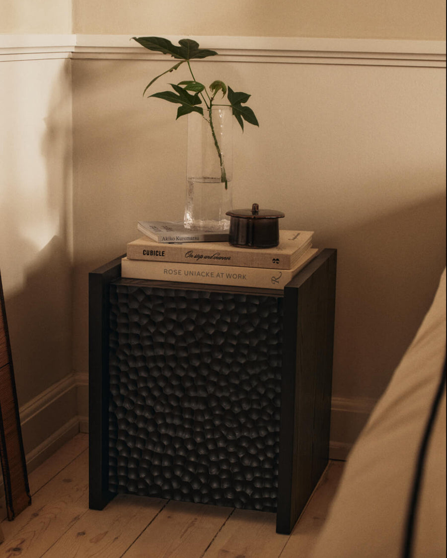 Kiru Carafe, Clear by ferm LIVING, holding a plant on a side table