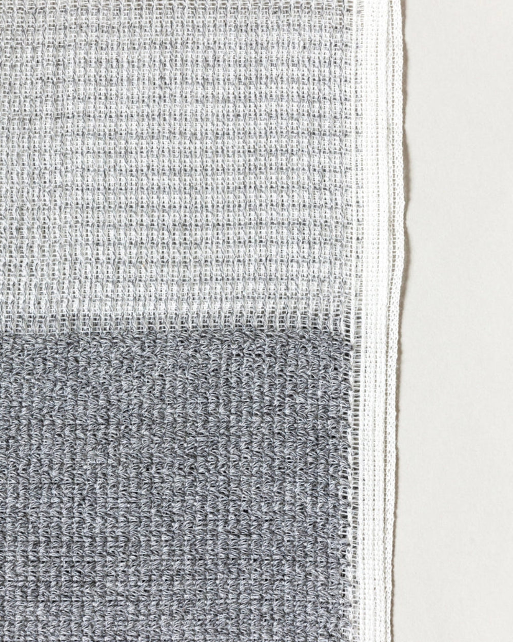 Binchotan Charcoal Body Scrub Towel by Morihata, close-up of the woven texture