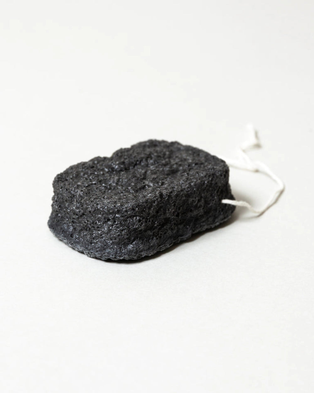 Binchotan Charcoal Facial Puff by Morihata, on white