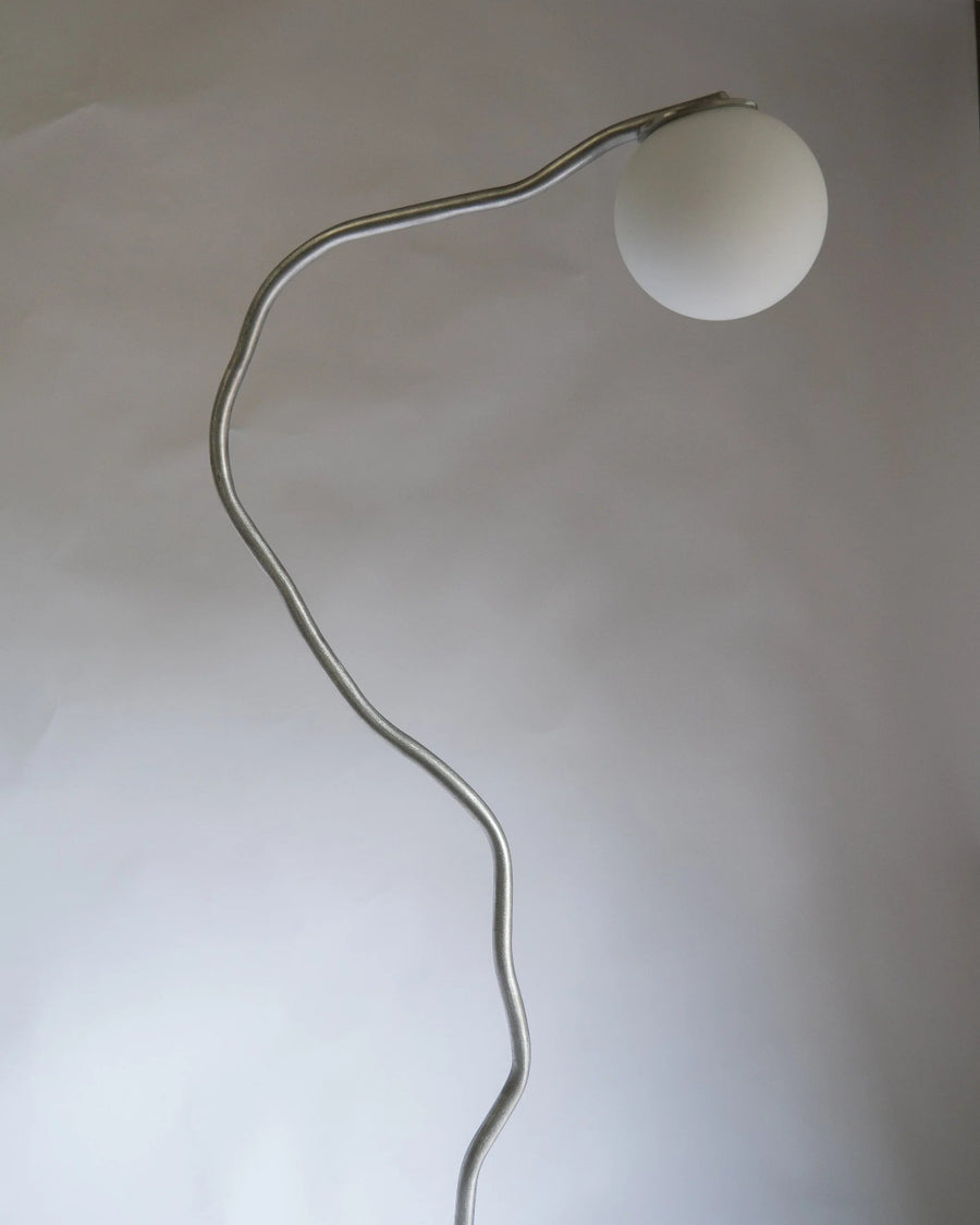 Pea Head Lamp, Aluminium by Six Dots Design, on a grey background