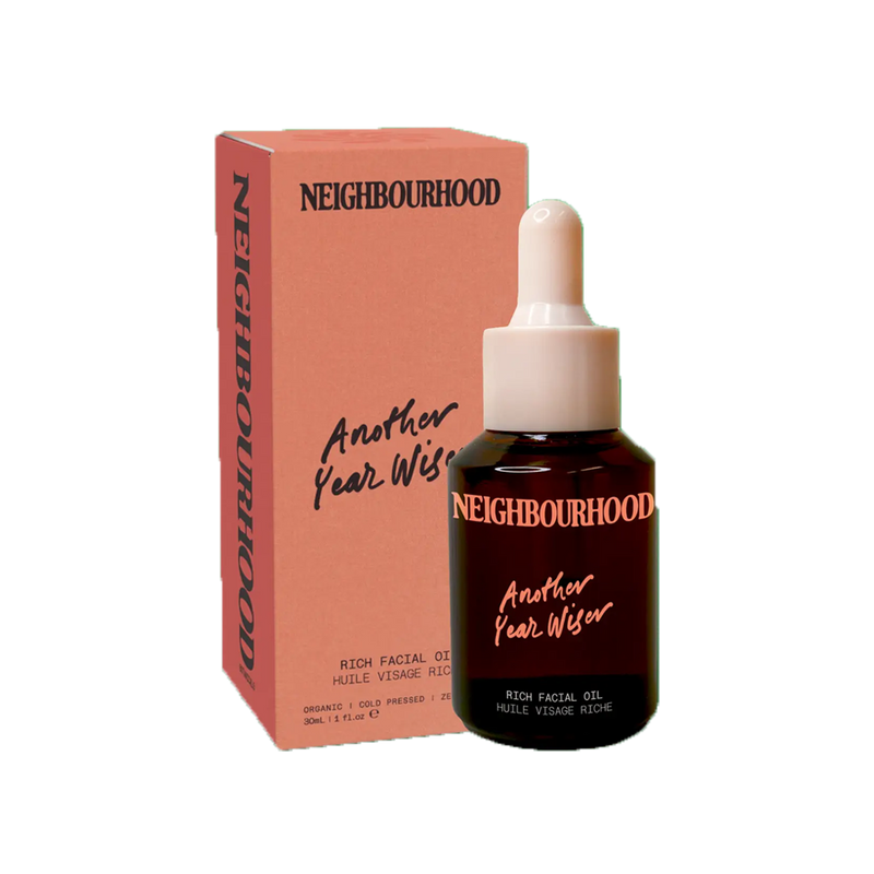  Another Year Wiser Facial Oil, 30ml by Neighbourhood Botanicals, beside its pink box 