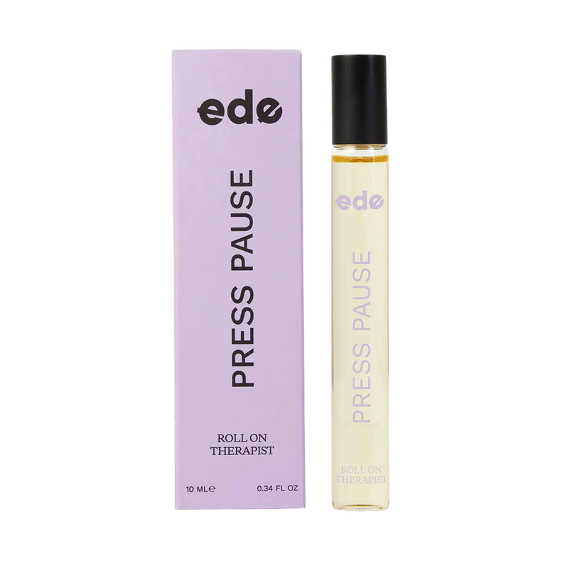  Press Pause Roll On, Aromatherapy Fragrance by ede, beside its orange box 