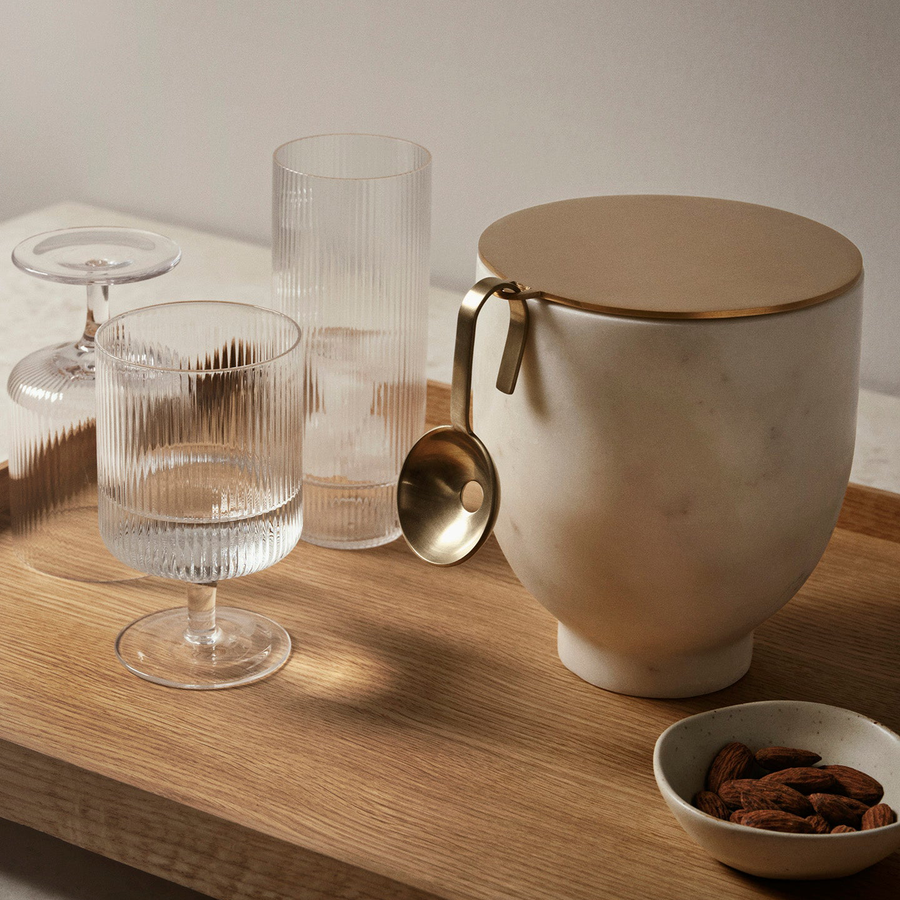 Ripple Wine Glasses, Set of 2, Clear by ferm LIVING, on a wooden table with a jug