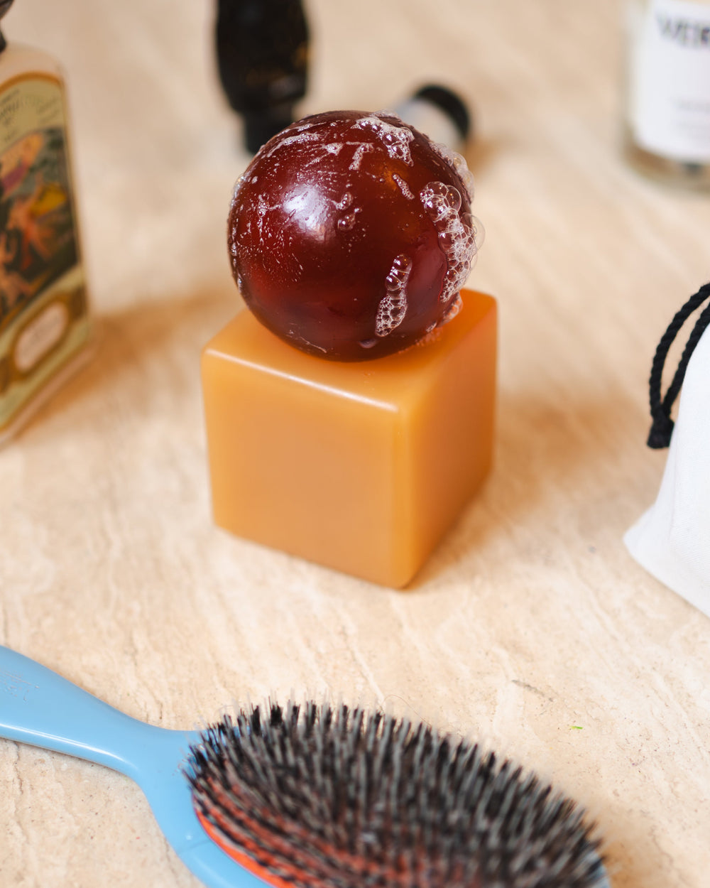 OBA Soap & Tray Set, Terralis by Matias Moellenbach, with a hairbrush on green marble