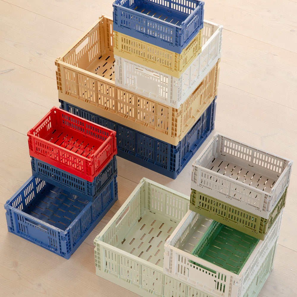 Colour Crate, Small, Off White by HAY, stacked in a range of colours
