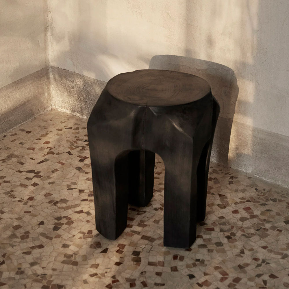 Root Stool, Black Stained by ferm LIVING, on a terrazzo floor
