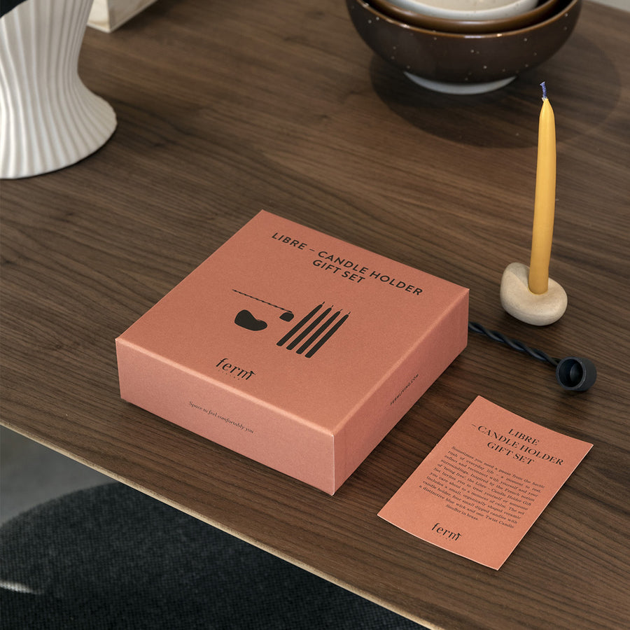 Libre, Candle Holder Gift Set by ferm LIVING, with its box on a wooden table