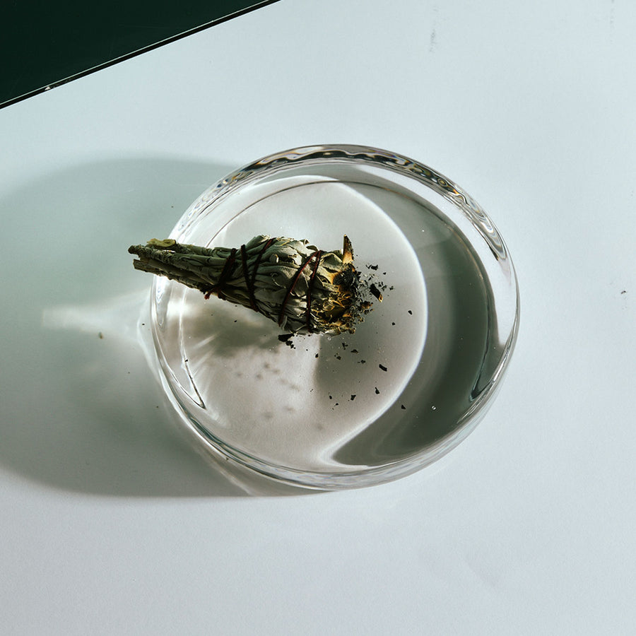 Sage Bundle by Earl of East, smouldering in a glass dish